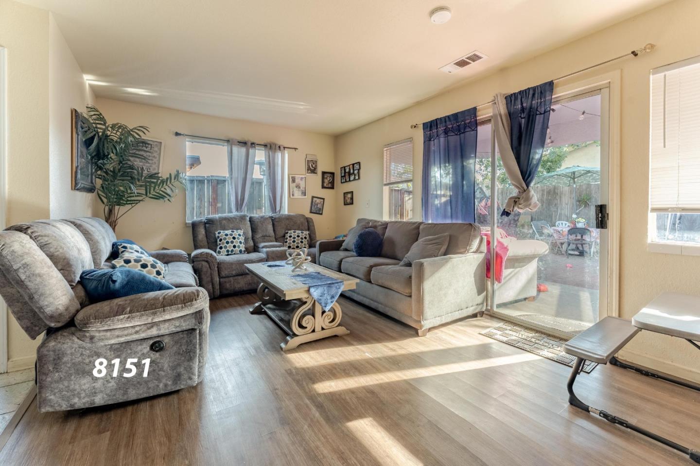 8151 Forest Street Gilroy, CA 95020 - Photo 31 of 43 a living room with furniture and a wooden floor