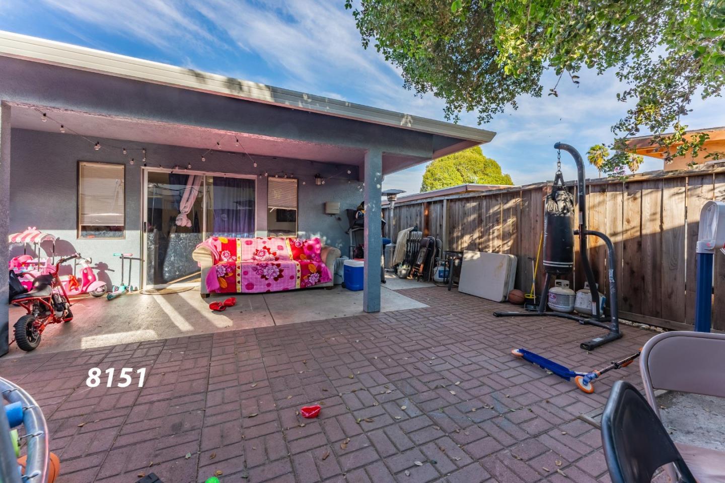 8151 Forest Street Gilroy, CA 95020 - Photo 35 of 43 a view of a chairs and table in the patio