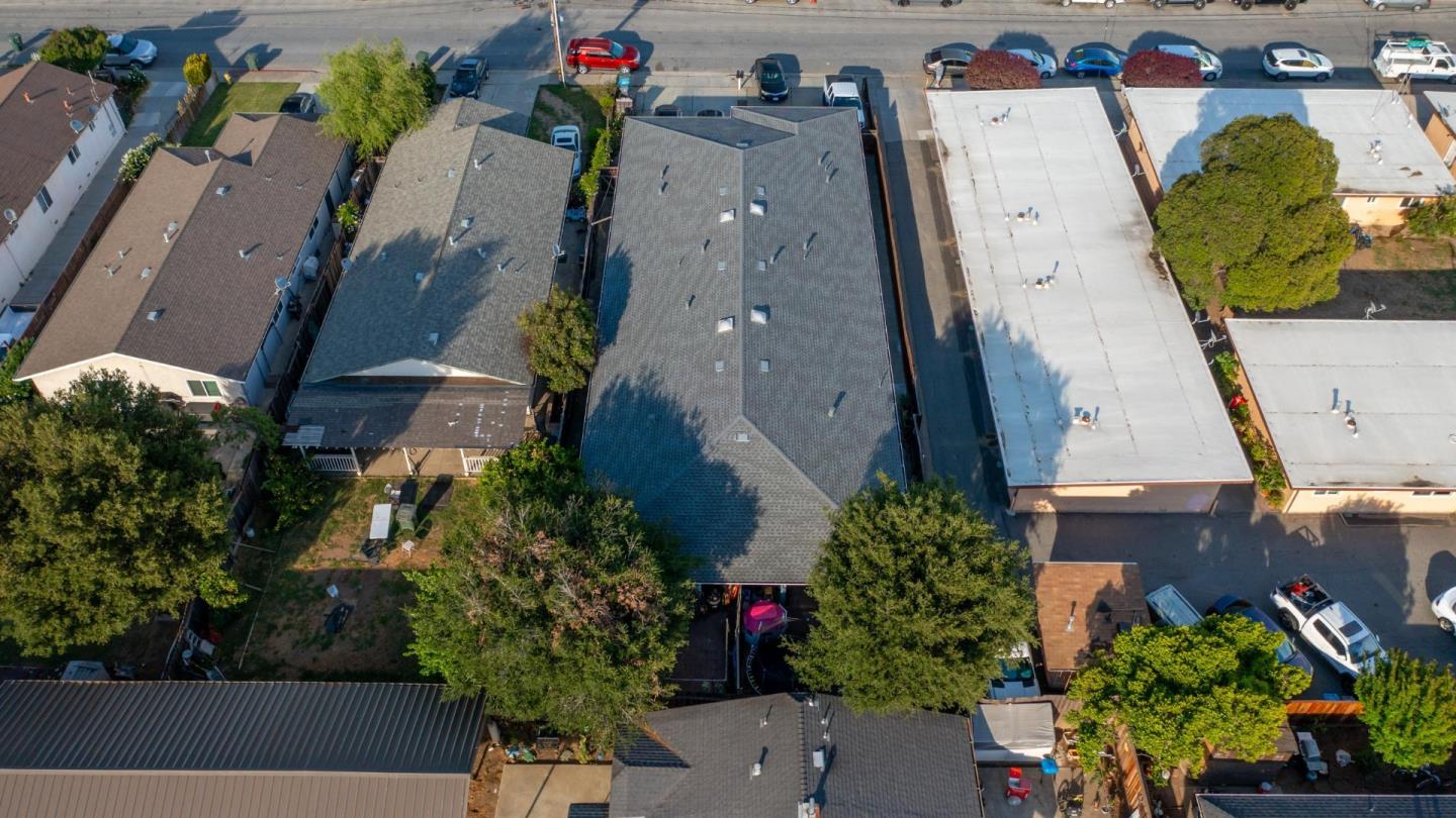 8151 Forest Street Gilroy, CA 95020 - Photo 38 of 43 an aerial view of a house with a yard and large trees
