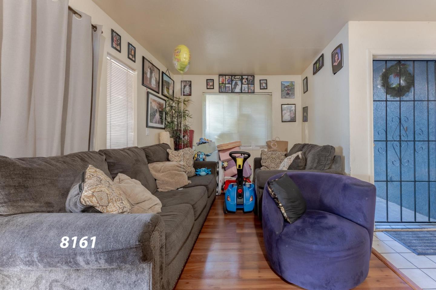 8151 Forest Street Gilroy, CA 95020 - Photo 6 of 43 a living room with furniture and a couch
