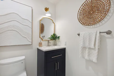 a bathroom with a sink and mirror