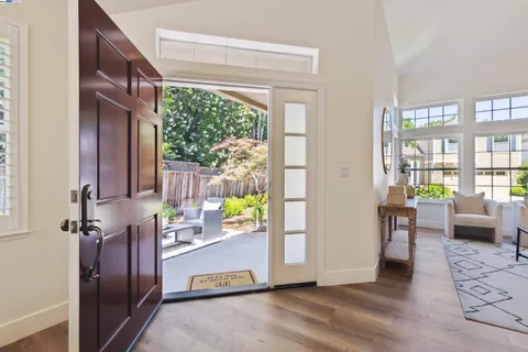 a view of kitchen with furniture and a window