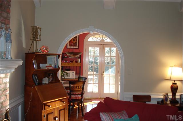929 Sawmill Road Raleigh, NC 27615 - Photo 3 of 9 a view of a workspace with furniture and a window