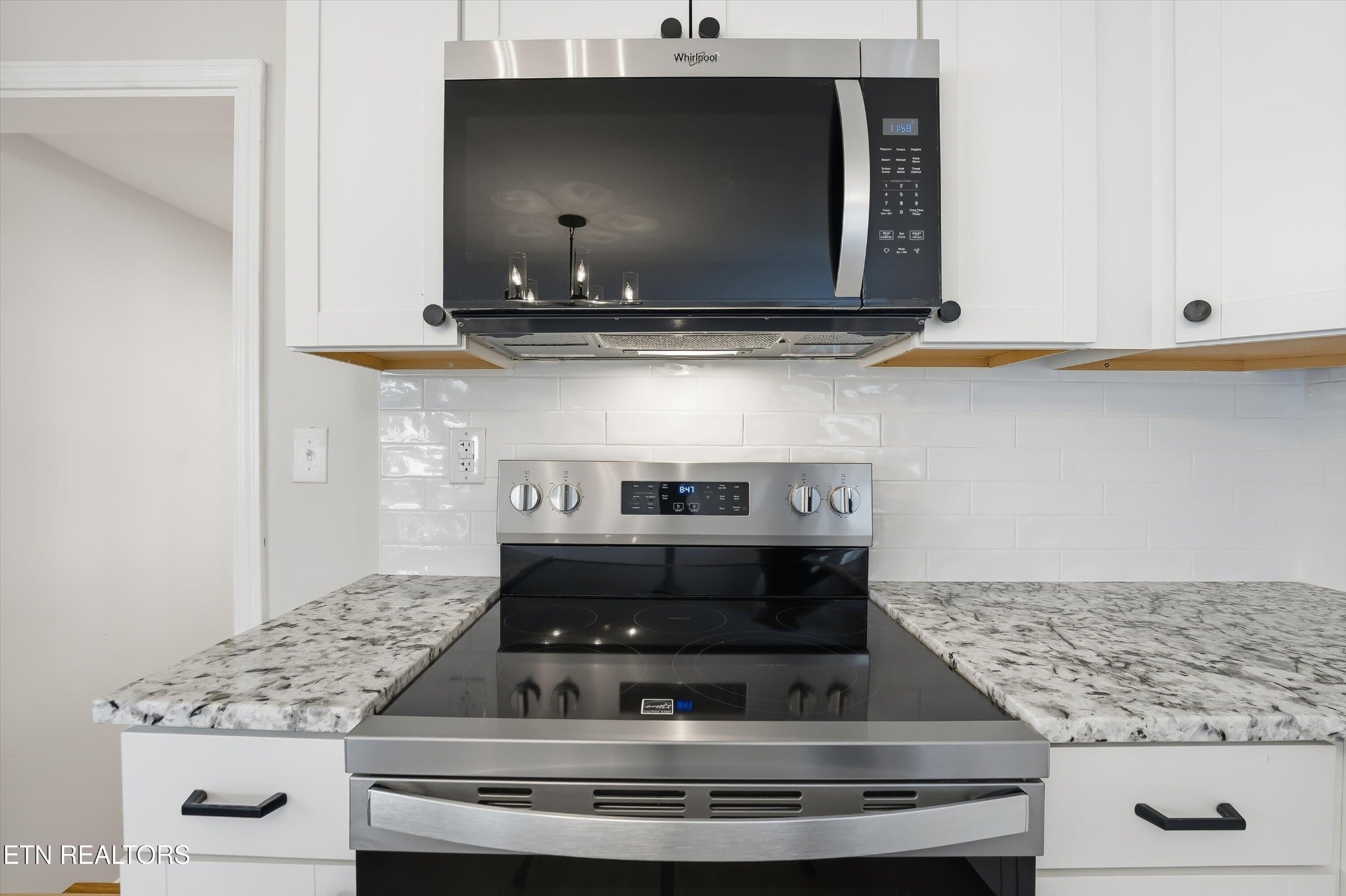 567 Dogwood Road Rockwood, TN 37854 - Photo 14 of 48 a stove top oven sitting inside of a kitchen