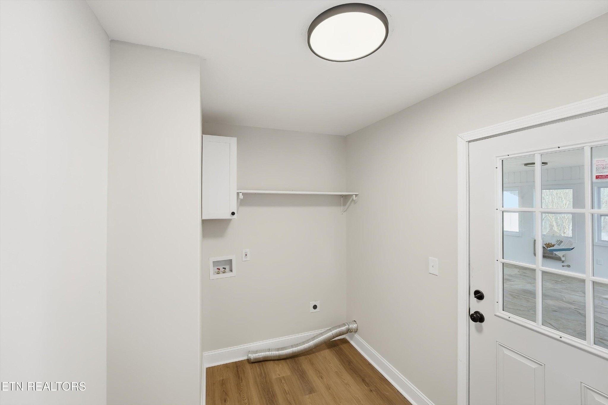 567 Dogwood Road Rockwood, TN 37854 - Photo 16 of 48 a view of a room with wooden floor and white walls