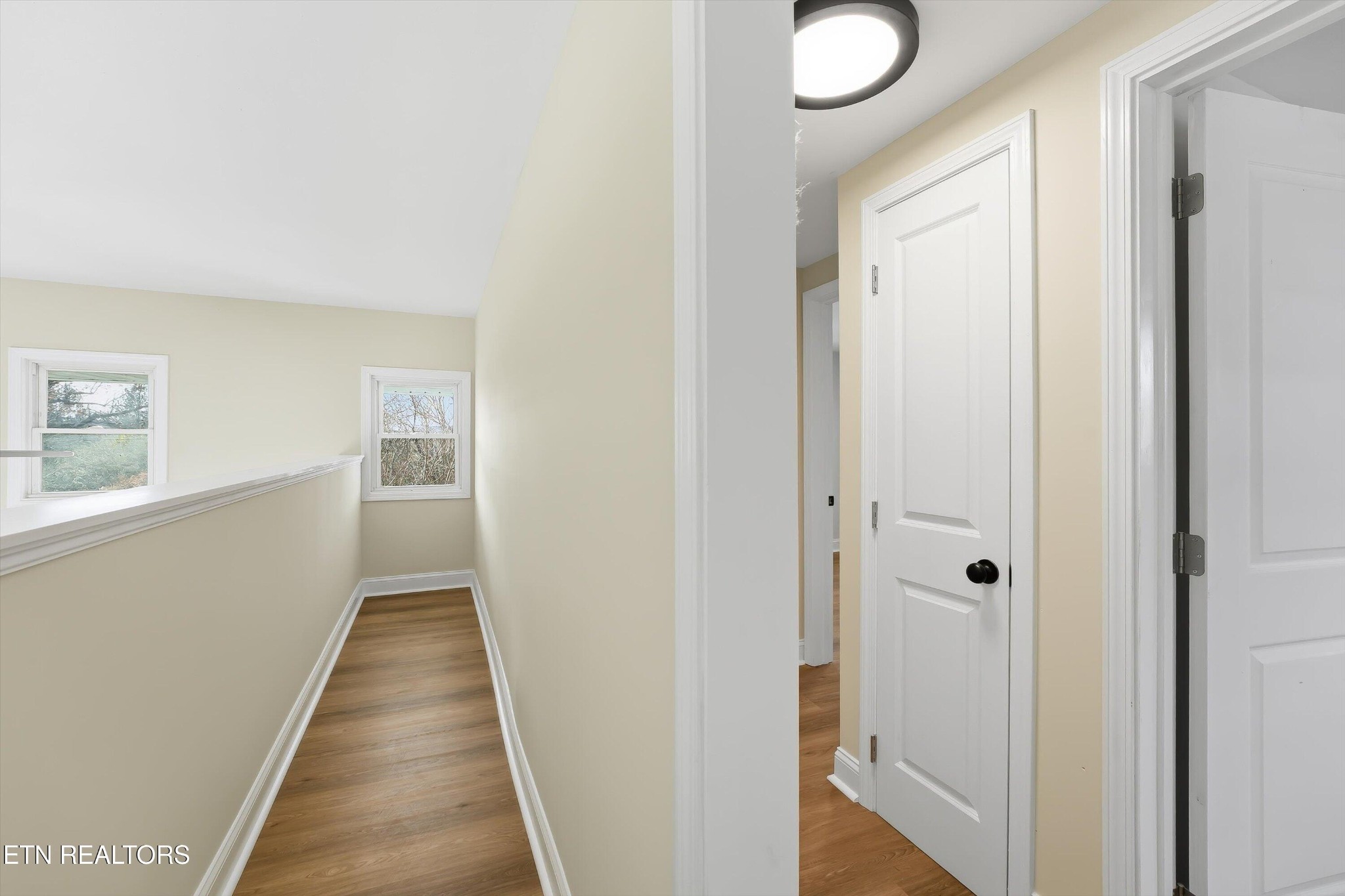 567 Dogwood Road Rockwood, TN 37854 - Photo 20 of 48 a view of a hallway with wooden floor and closet
