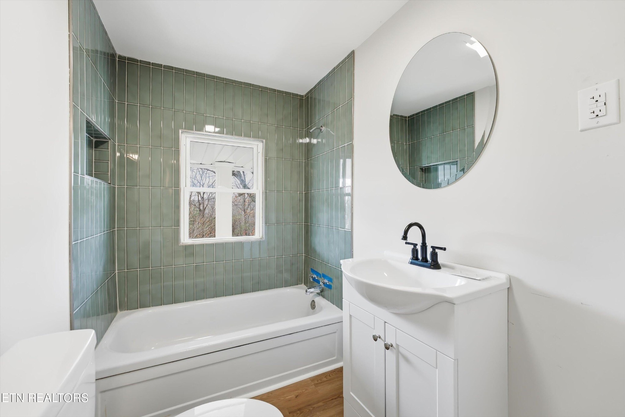 567 Dogwood Road Rockwood, TN 37854 - Photo 23 of 48 a bathroom with a sink a toilet and a mirror