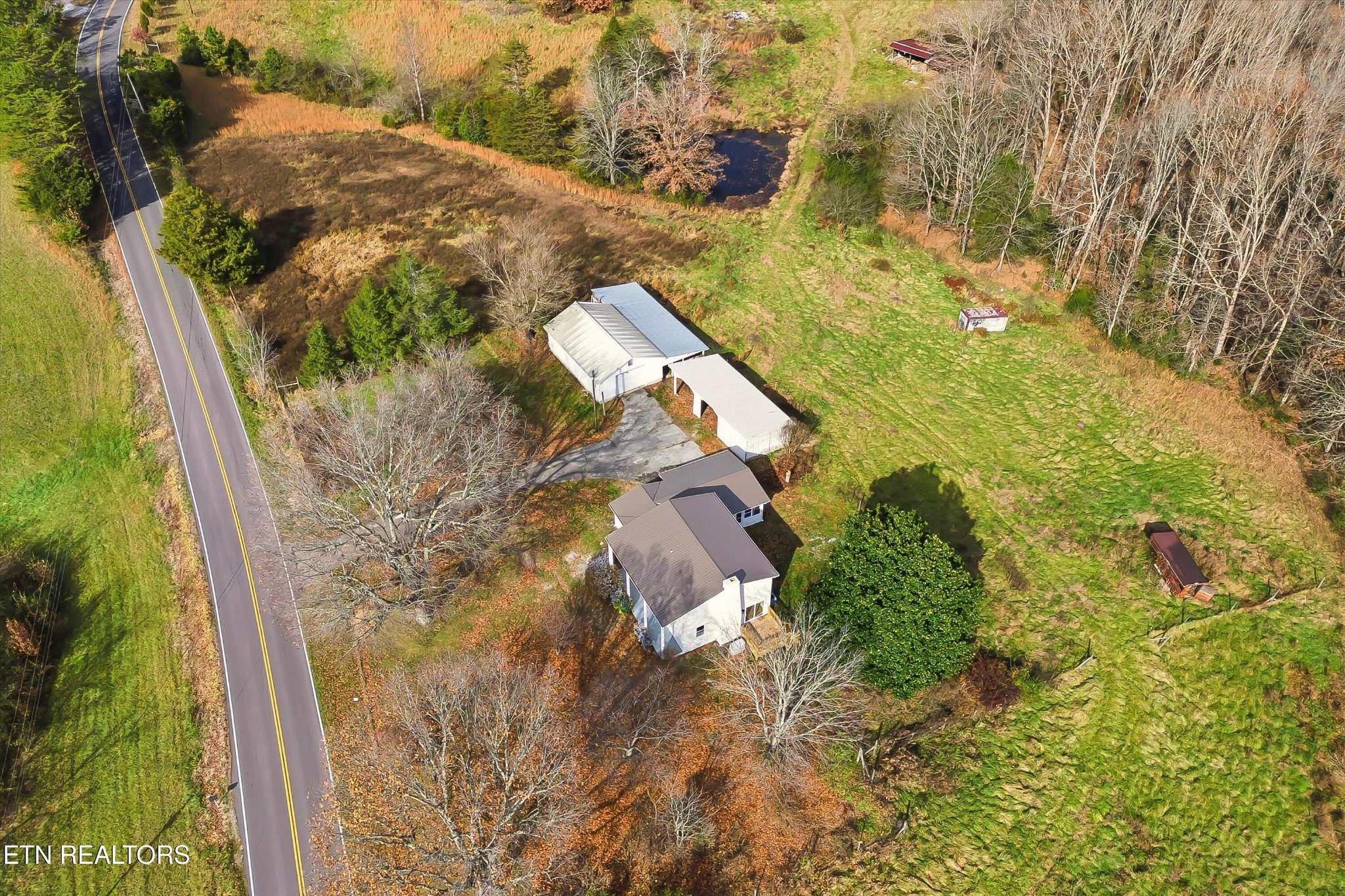 567 Dogwood Road Rockwood, TN 37854 - Photo 46 of 48 an aerial view of residential houses with outdoor space
