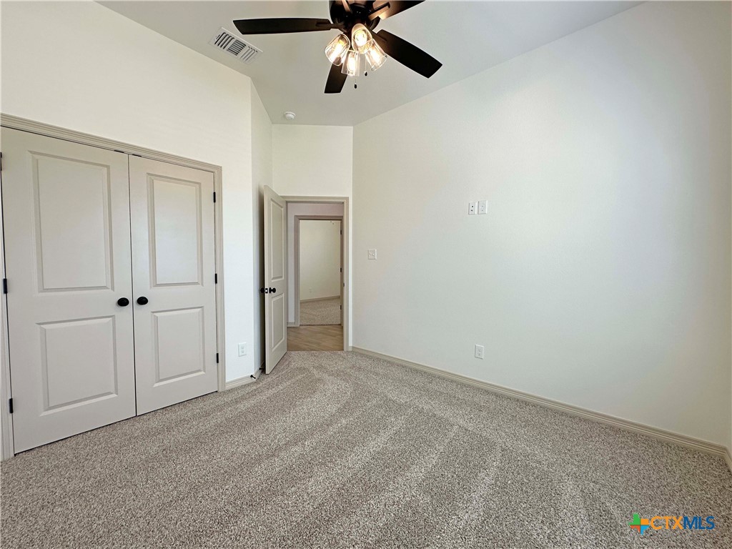 4521 Agave Trail Temple, TX 76502 - Photo 21 of 25 a view of an empty room and chandelier fan
