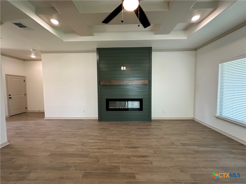4521 Agave Trail Temple, TX 76502 - Photo 4 of 25 a view of an empty room with a fireplace and a window