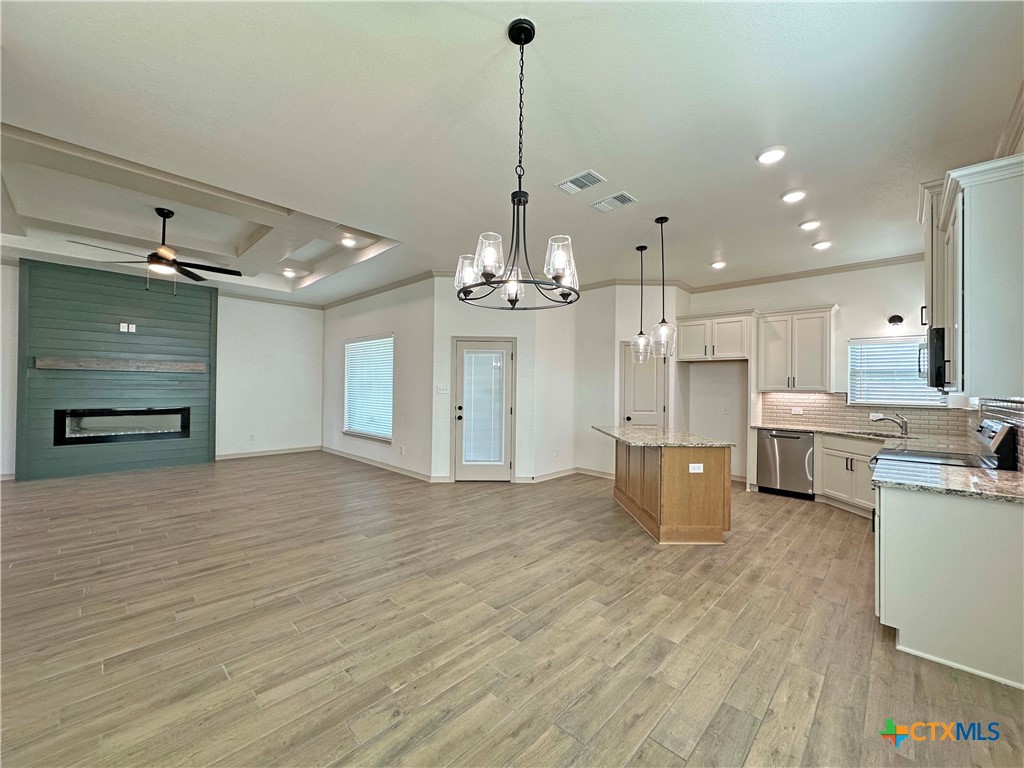 4521 Agave Trail Temple, TX 76502 - Photo 7 of 25 a view of a kitchen with stove and cabinets
