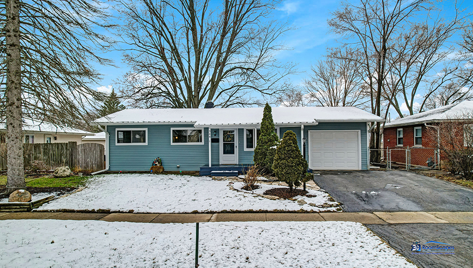348 Raupp Boulevard Buffalo Grove, IL 60089 - Photo 1 of 41 a front view of a house with garden
