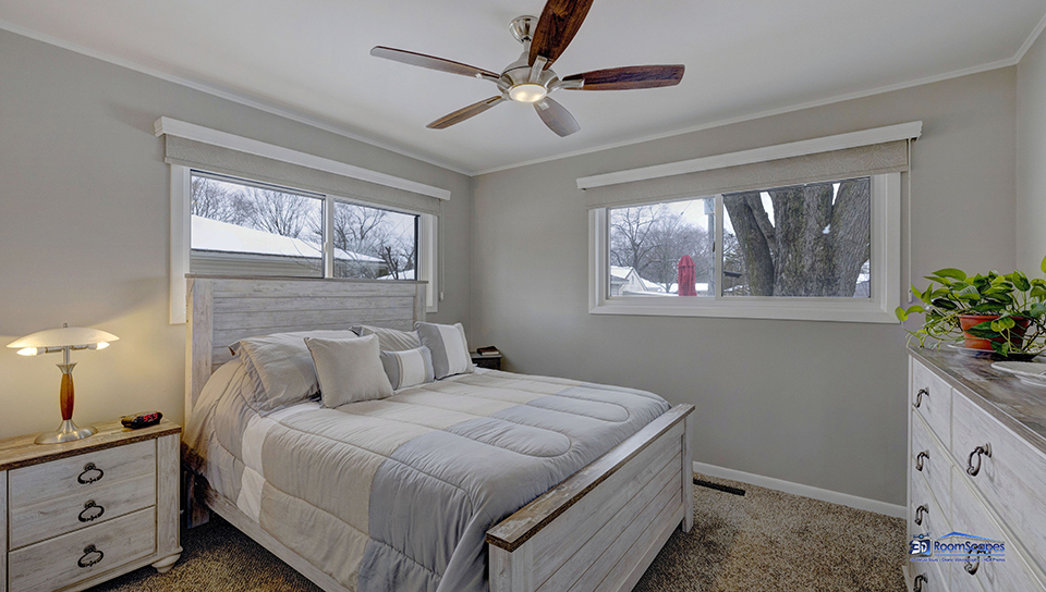 348 Raupp Boulevard Buffalo Grove, IL 60089 - Photo 11 of 41 a bedroom with a bed and a window
