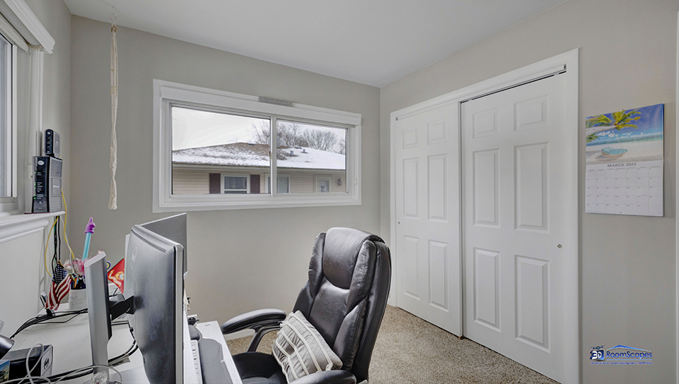 348 Raupp Boulevard Buffalo Grove, IL 60089 - Photo 13 of 41 a view of workspace with wooden floor windows