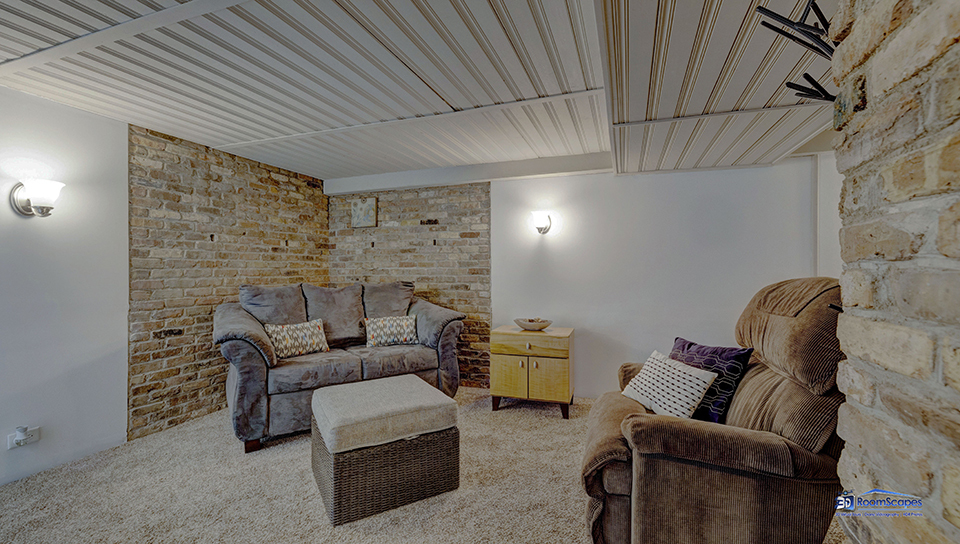 348 Raupp Boulevard Buffalo Grove, IL 60089 - Photo 17 of 41 a living room with furniture and a fireplace