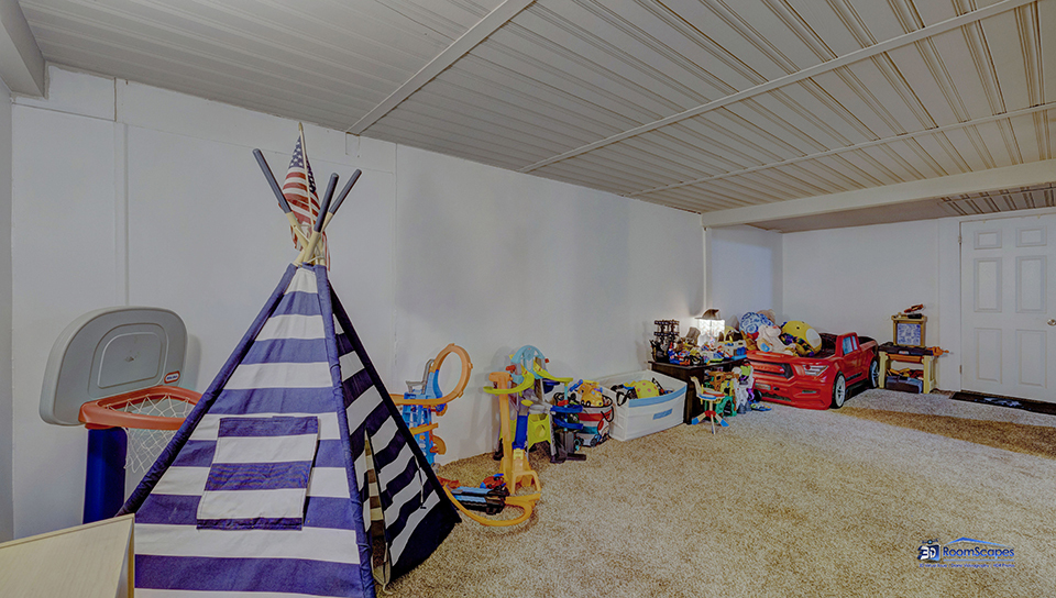 348 Raupp Boulevard Buffalo Grove, IL 60089 - Photo 19 of 41 a room with lots of white furniture and toys