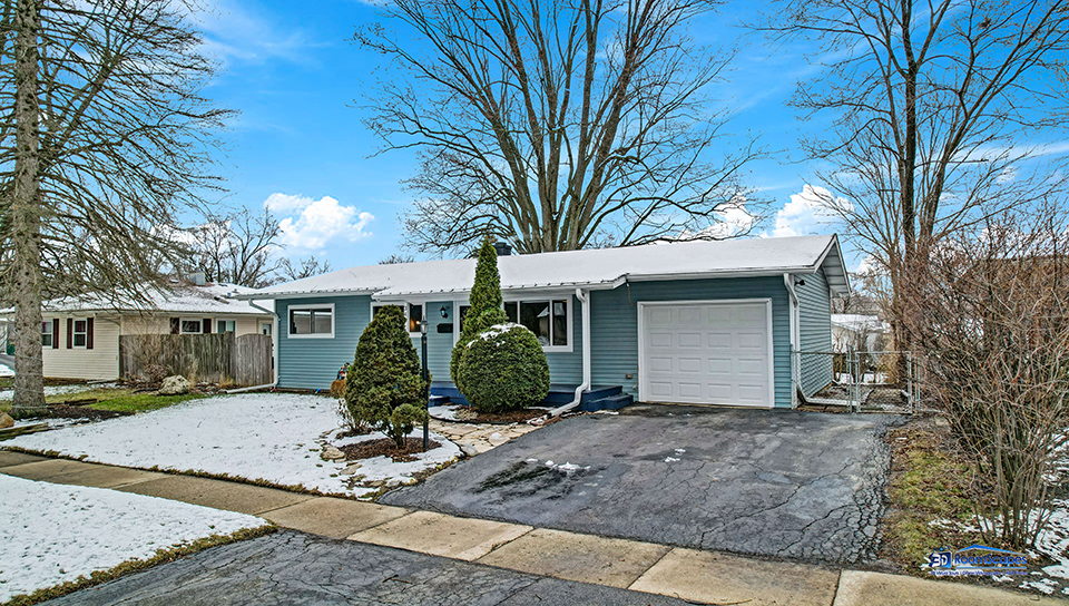 348 Raupp Boulevard Buffalo Grove, IL 60089 - Photo 28 of 41 a view of a house with a yard