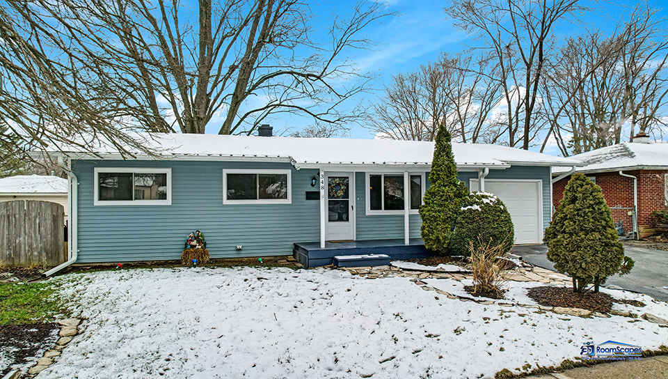348 Raupp Boulevard Buffalo Grove, IL 60089 - Photo 29 of 41 a front view of a house with garden