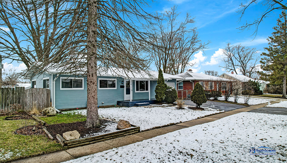 348 Raupp Boulevard Buffalo Grove, IL 60089 - Photo 30 of 41 a front view of a house with yard