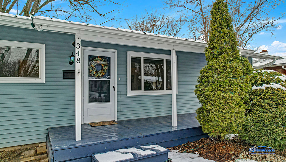 348 Raupp Boulevard Buffalo Grove, IL 60089 - Photo 31 of 41 a view of a house with a tree