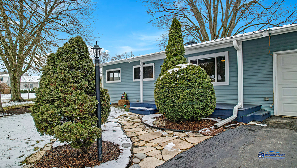 348 Raupp Boulevard Buffalo Grove, IL 60089 - Photo 32 of 41 a front view of a house with garden