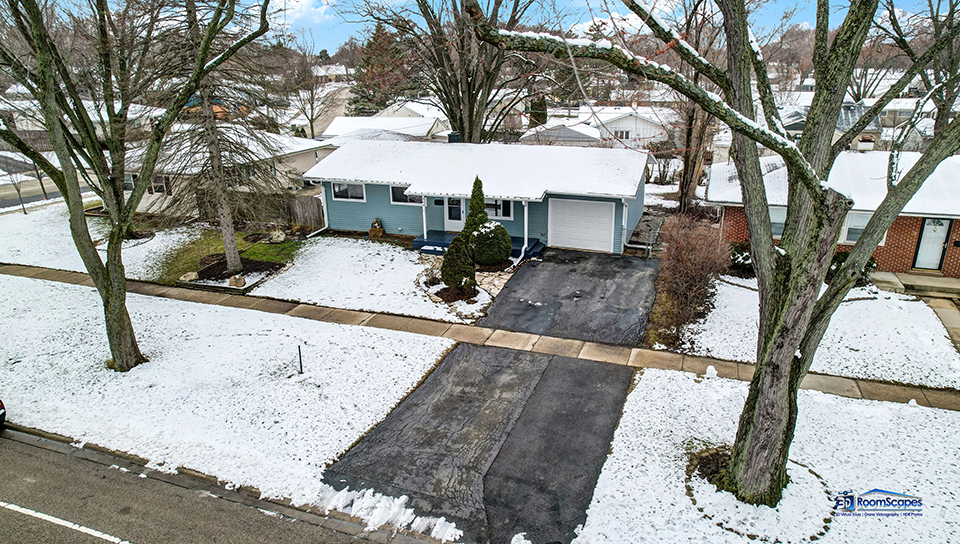 348 Raupp Boulevard Buffalo Grove, IL 60089 - Photo 36 of 41 a view of a house with snow on the road