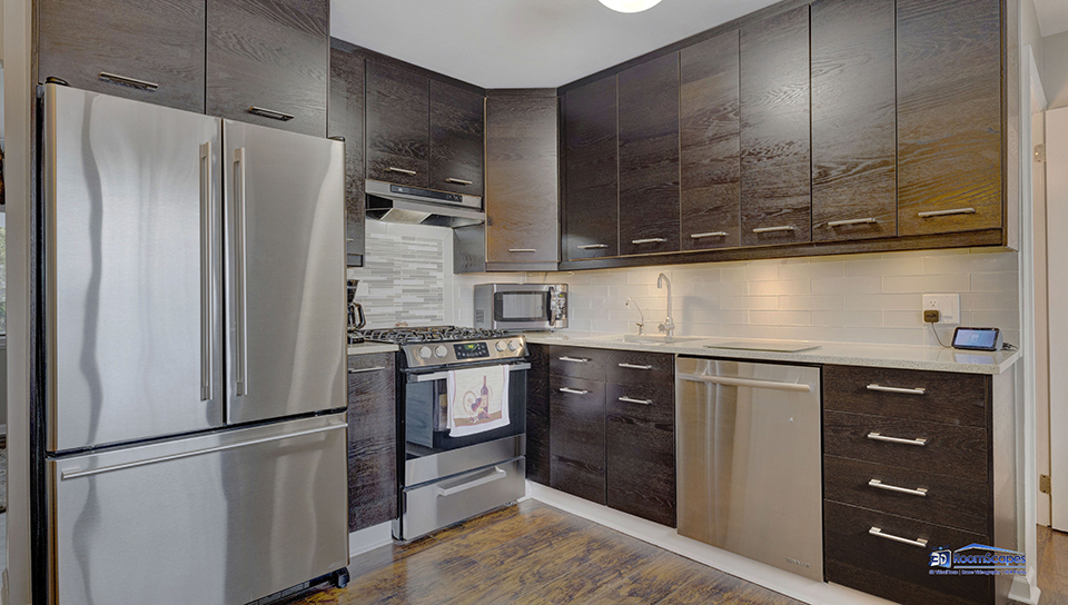 348 Raupp Boulevard Buffalo Grove, IL 60089 - Photo 6 of 41 a kitchen with stainless steel appliances granite countertop a refrigerator and a stove