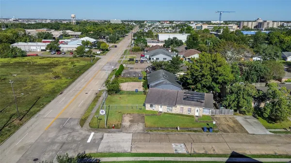 an aerial view of a house with a garden
