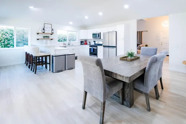 a view of a dining room with furniture