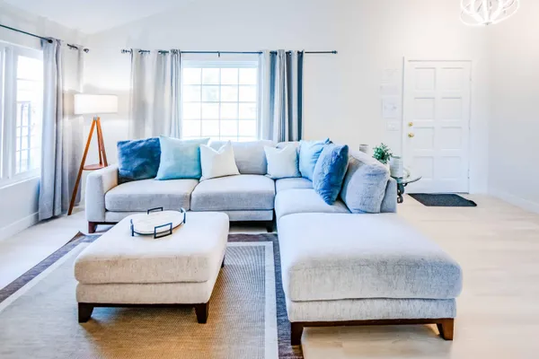 a living room with furniture and a couch