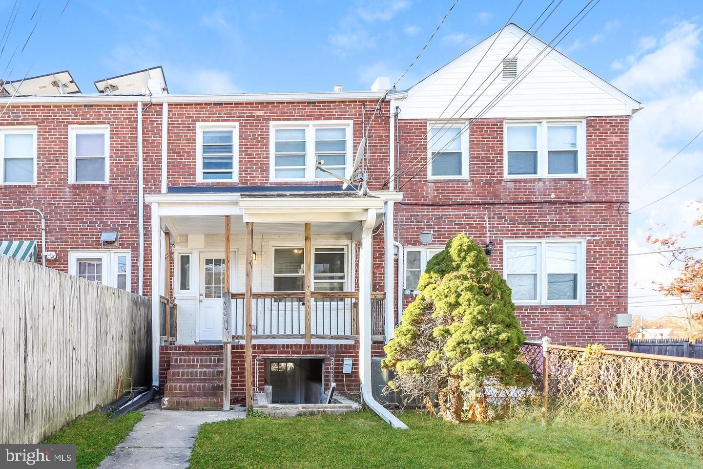 8351 Edgedale Road Baltimore, MD 21234 - Photo 3 of 22 a front view of a house with garden