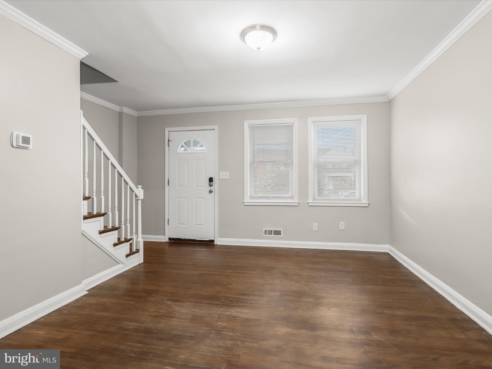 8351 Edgedale Road Baltimore, MD 21234 - Photo 6 of 22 wooden floor in an empty room with a window
