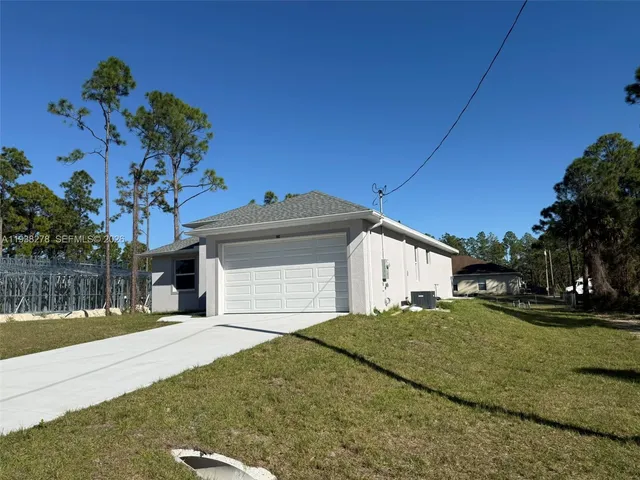 $298,900 | 193 Castle Avenue South, Lehigh Acres, FL 33974
