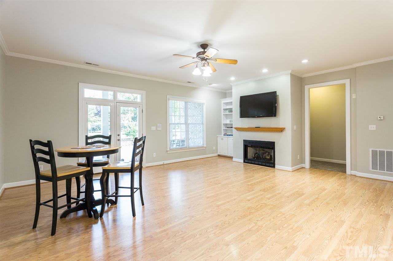 12404 Bayleaf Church Road Raleigh, NC 27614 - Photo 17 of 25 a view of a livingroom with furniture and a fireplace