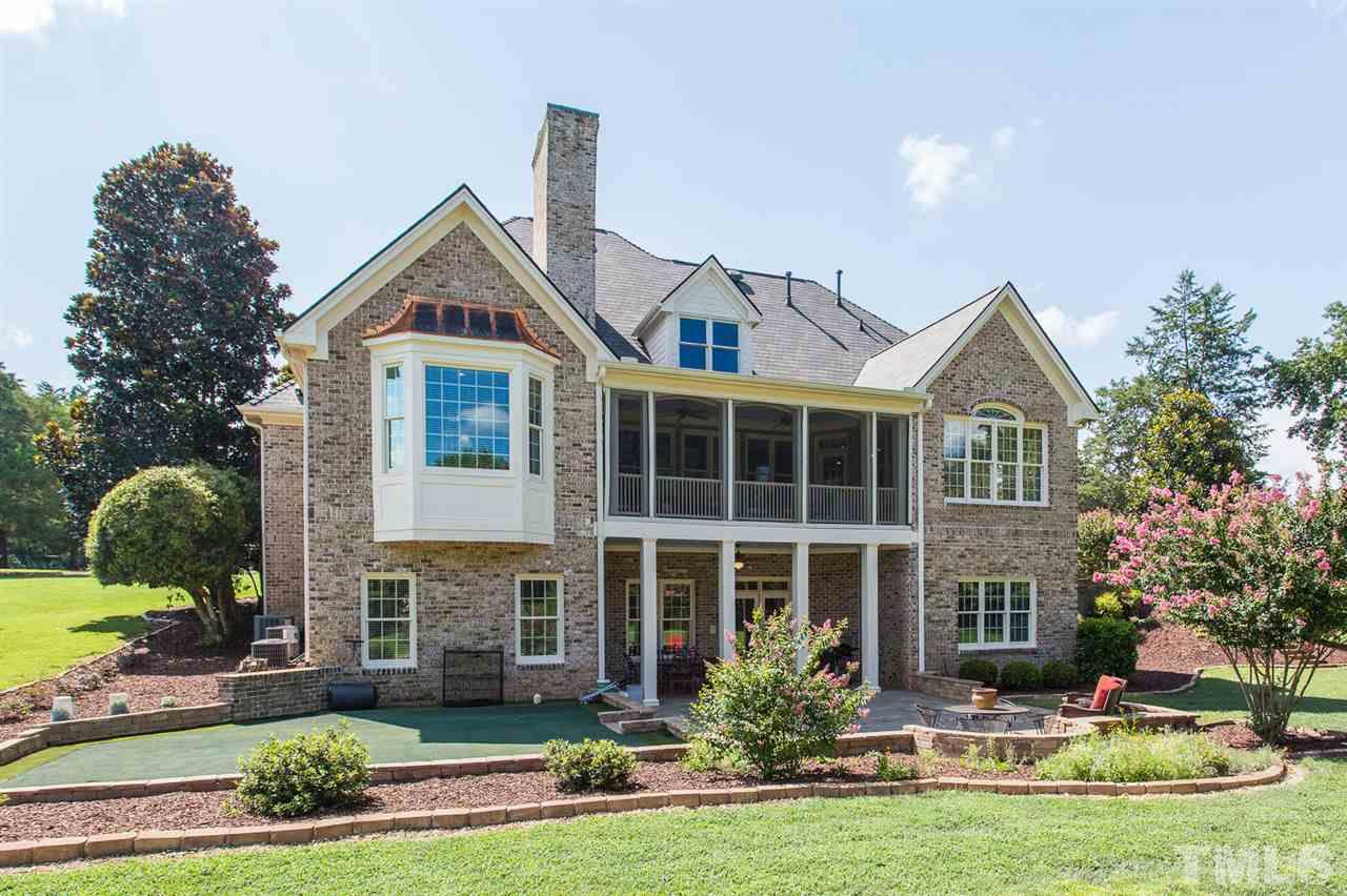 12404 Bayleaf Church Road Raleigh, NC 27614 - Photo 4 of 25 a front view of a house with garden