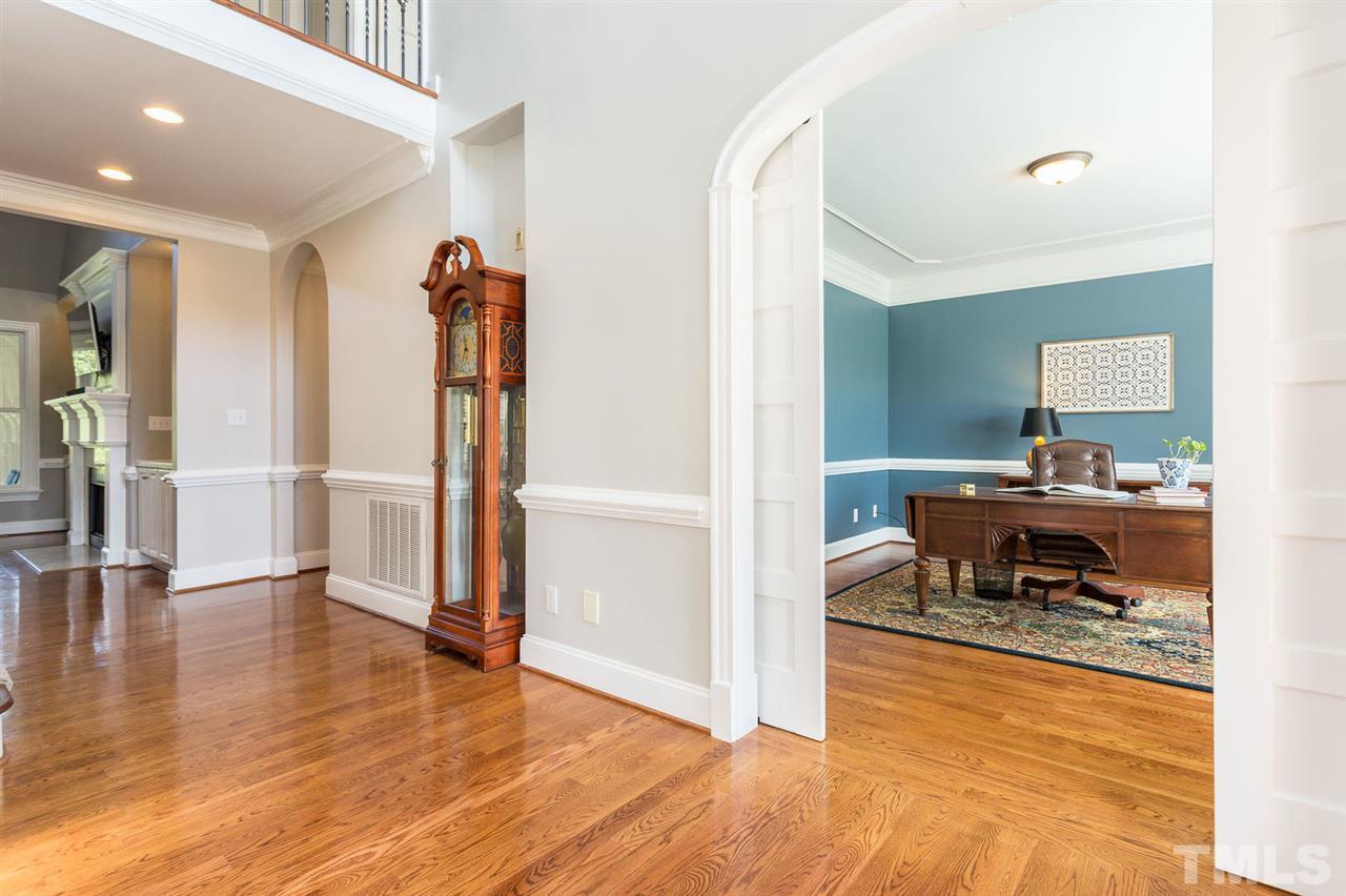 12404 Bayleaf Church Road Raleigh, NC 27614 - Photo 6 of 25 a living room with furniture and a wooden floor