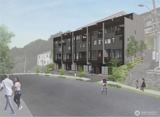 a building exterior with furniture and garden