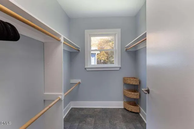 a view of deck with table and chairs and wooden floor