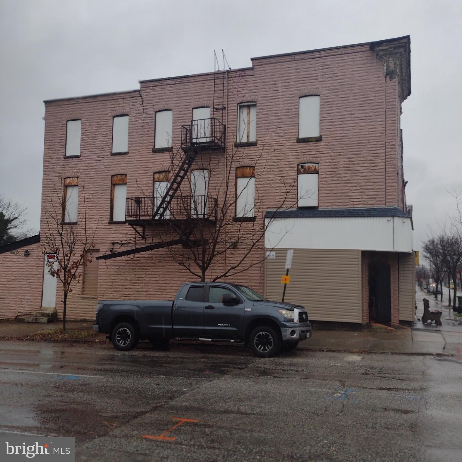 1801 West Pratt Street Baltimore, MD 21223 - Photo 4 of 11 a car parked in front of a building