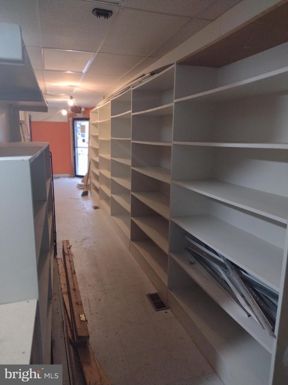 1801 West Pratt Street Baltimore, MD 21223 - Photo 6 of 11 a view of walk in closet with clothes and shoes