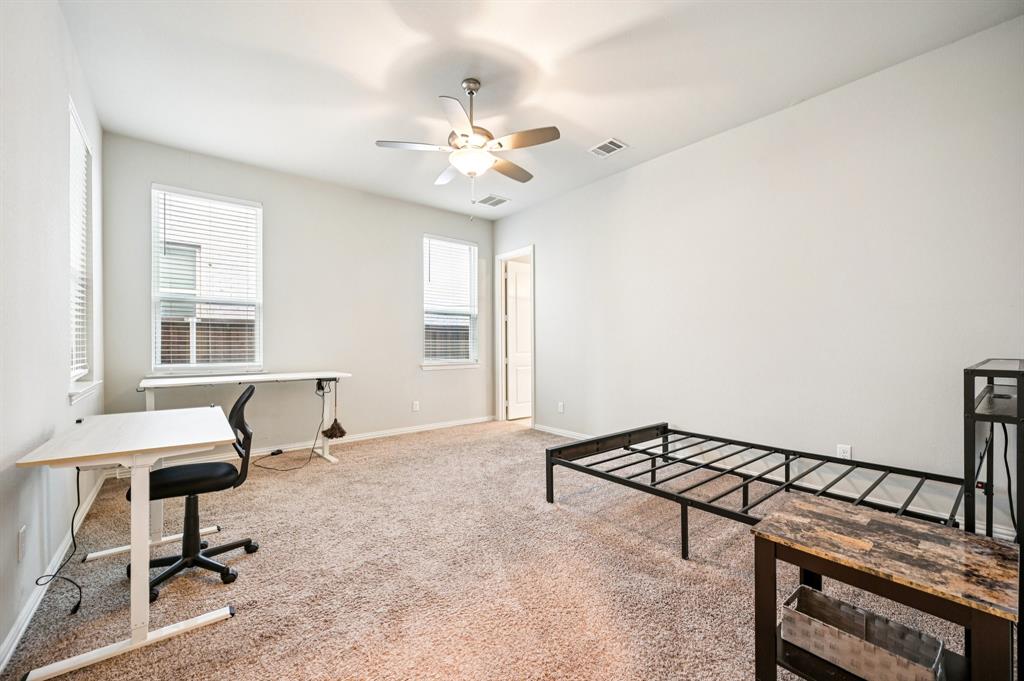 8039 Copper Way Dallas, TX 75252 - Photo 16 of 30 a view of a workspace with furniture and a window