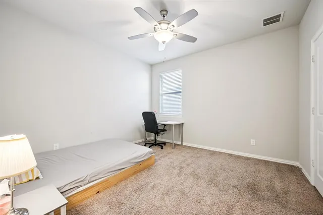 a workspace with furniture and a window