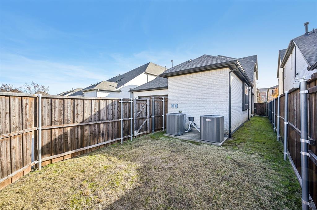 8039 Copper Way Dallas, TX 75252 - Photo 28 of 30 a view of a backyard