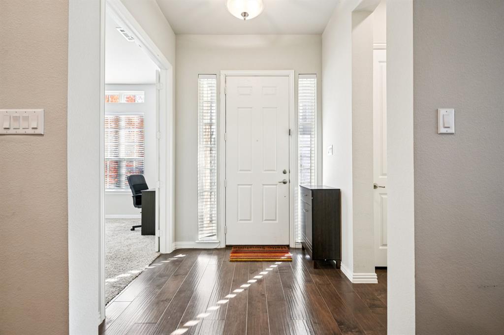 8039 Copper Way Dallas, TX 75252 - Photo 4 of 30 wooden floor with view in front door