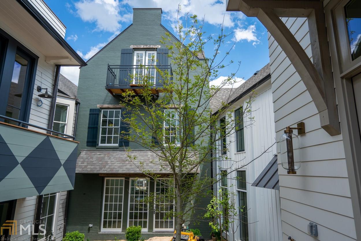 Charming 3 story Painted Brick Townhome in Summerhill by Hedgewood Homes