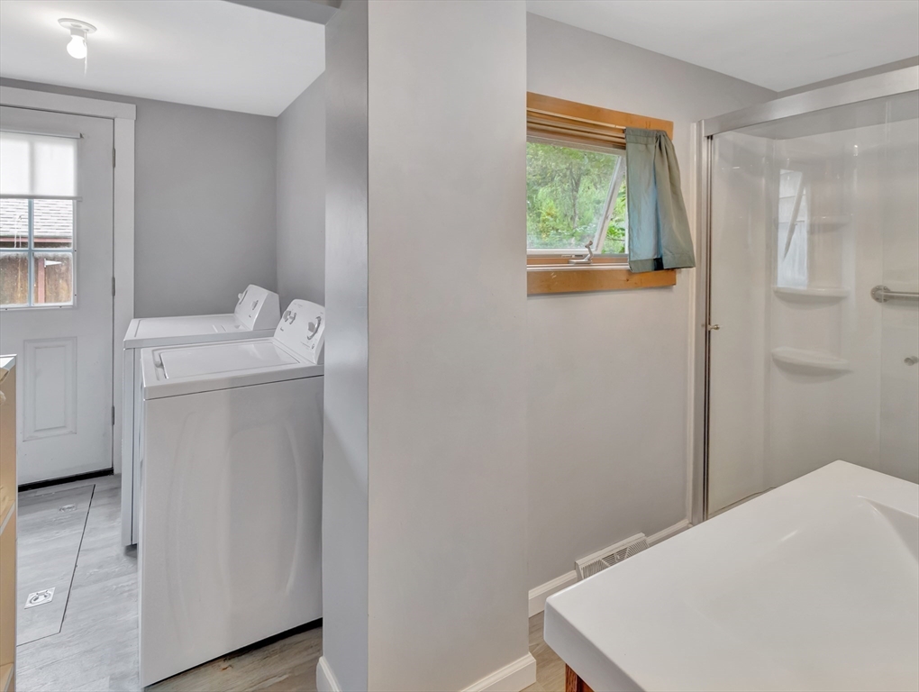 10 Ridge Road Norton, MA 02766 - Photo 13 of 34 a utility room with a window dryer and washer