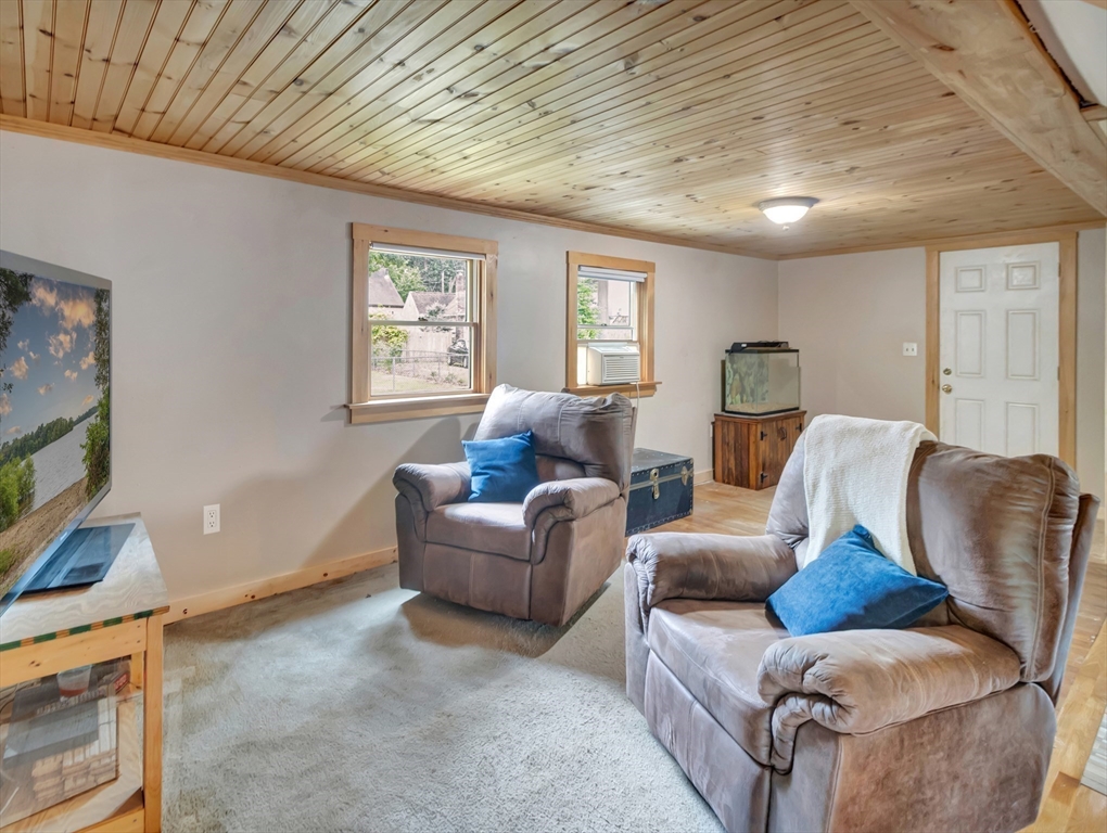 10 Ridge Road Norton, MA 02766 - Photo 15 of 34 a living room with furniture and a window