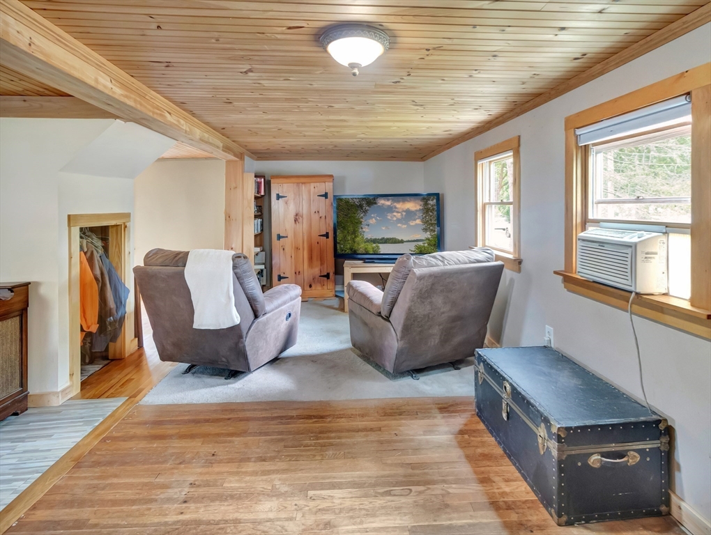 10 Ridge Road Norton, MA 02766 - Photo 17 of 34 a living room with furniture and a flat screen tv