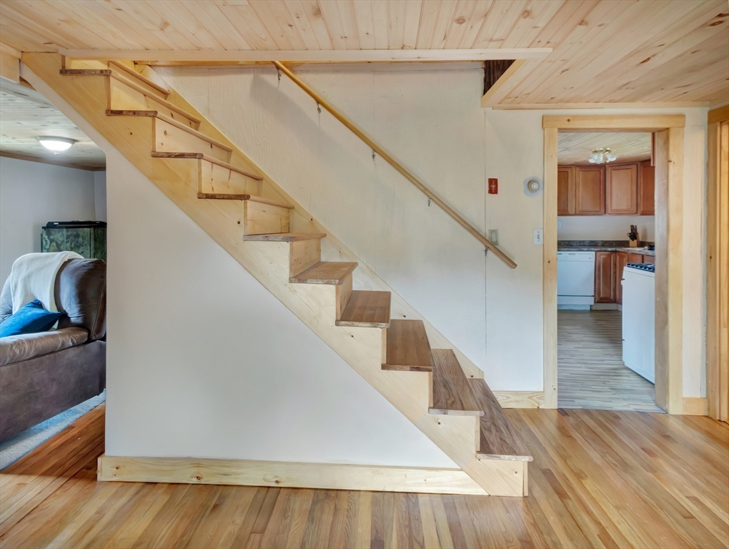 10 Ridge Road Norton, MA 02766 - Photo 19 of 34 a view of entryway and hall with wooden floor