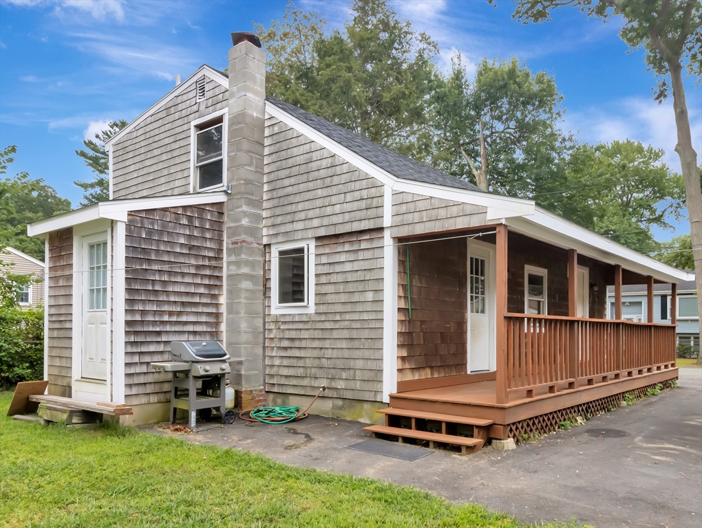 10 Ridge Road Norton, MA 02766 - Photo 2 of 34 a view of backyard with a deck